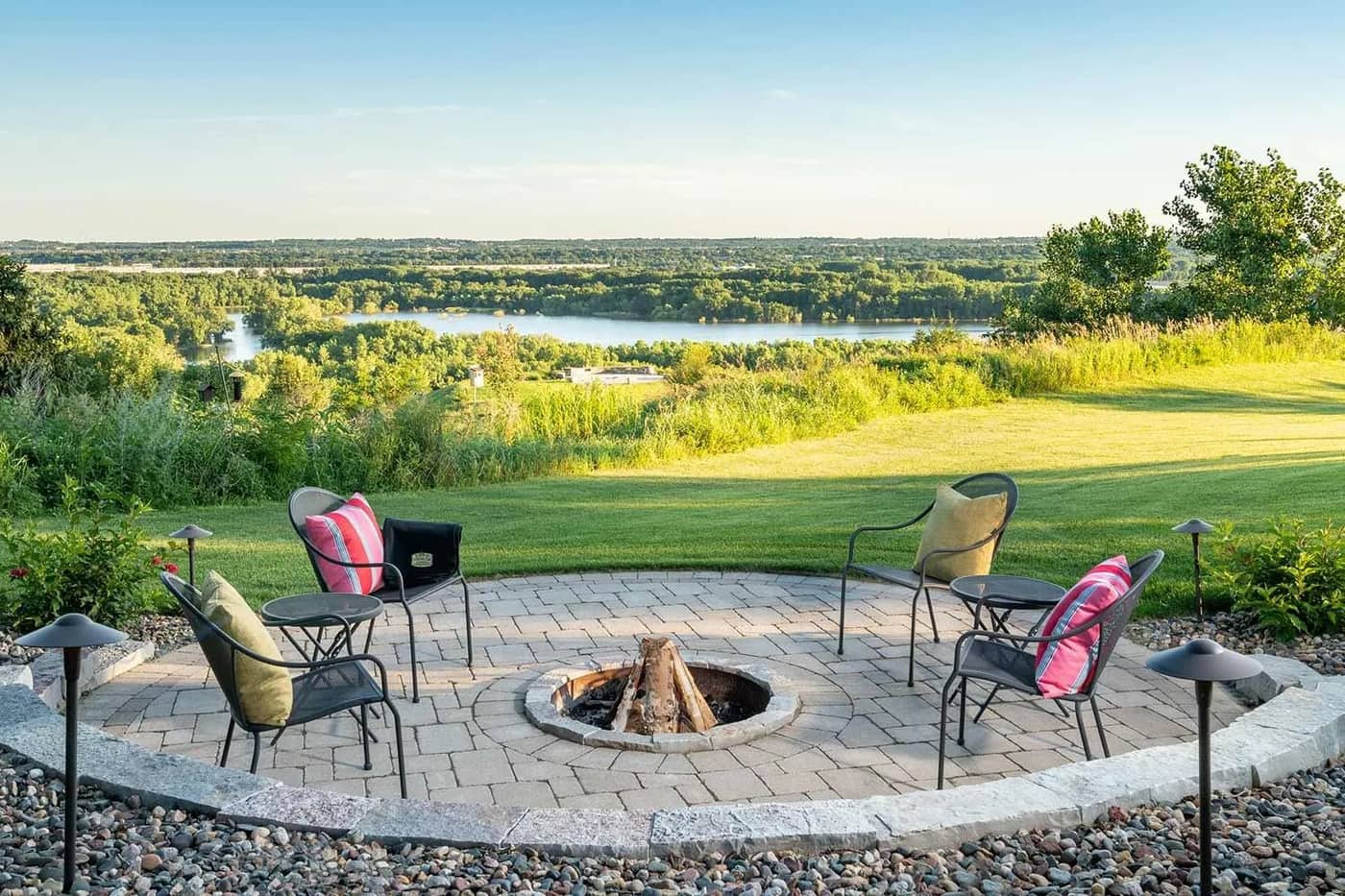 Stone patio and fire pit overlooking a river valley in Central Pennsylvania