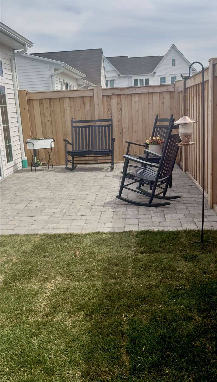 Paver patio installation in a compact Mechanicsburg townhouse backyard